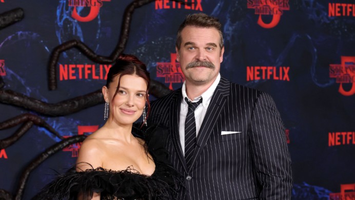 Reunited on the Red Carpet: Millie Bobby Brown and David Harbour Break the Silence With a Smile